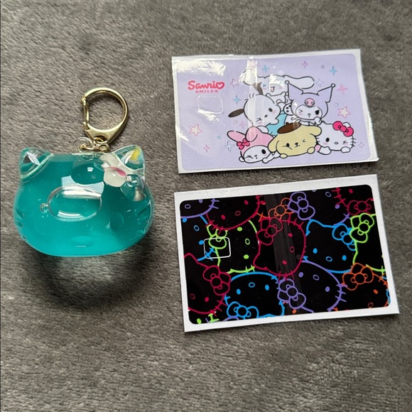 Sanrio Accessories - Sanrio Hello Kitty Snowglobe keychain and credit card stickers